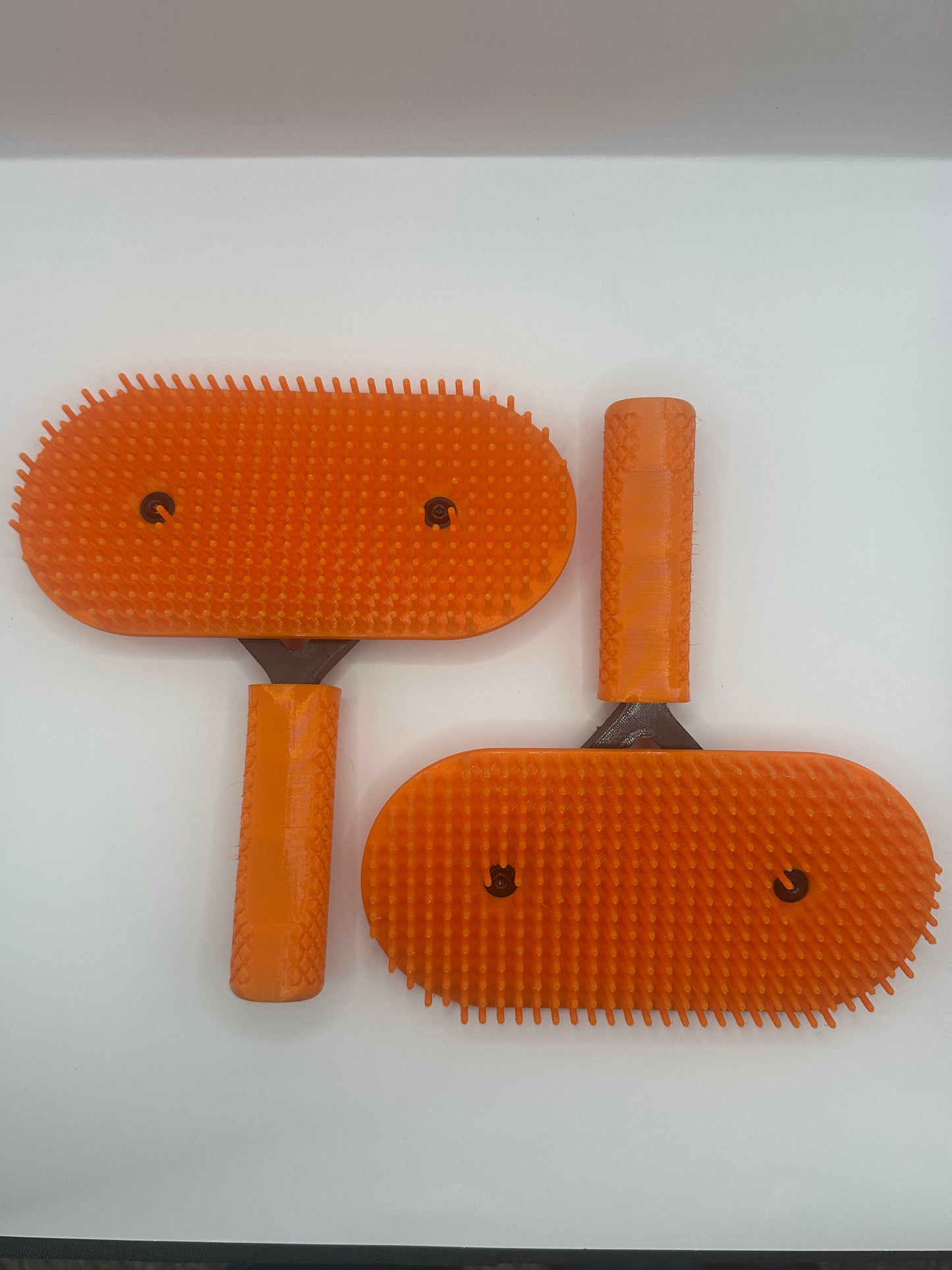 Orange And Black Pakzs Ultimate Grooming Brush