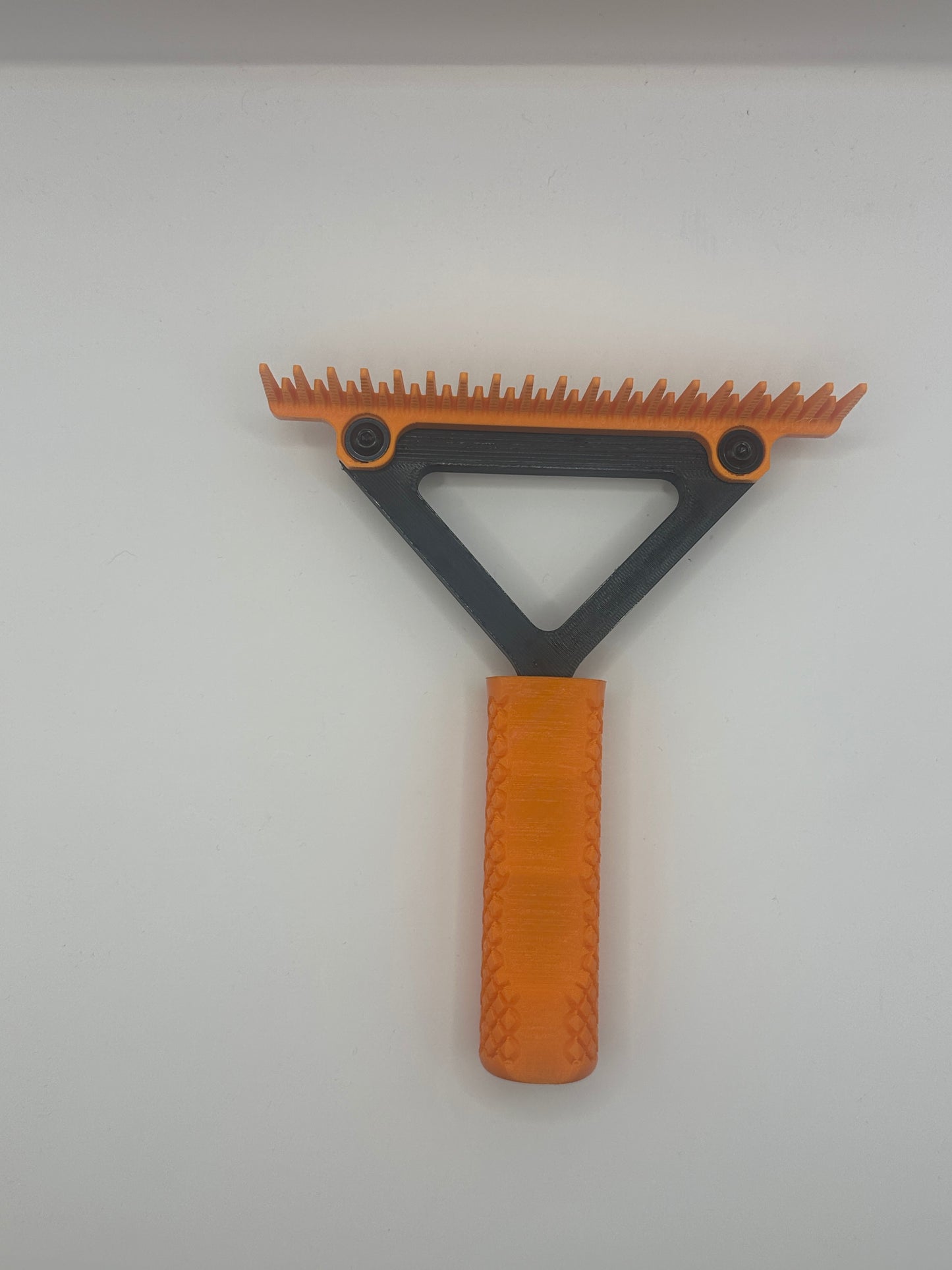 Small Orange And Black Pakzs Ultimate Grooming Comb